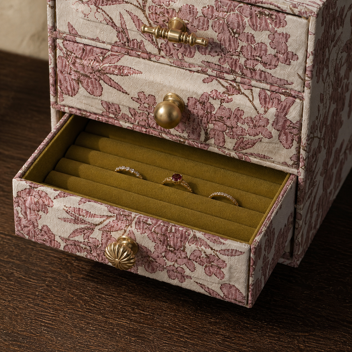 Close view of velvet ring drawer and floral fabric exterior